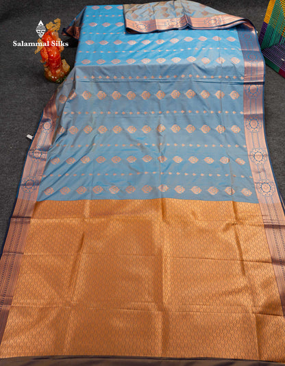 Beautiful Pastel Blue Zari Butta Semi Silk Saree With Contrast Dual Tone Navy Blue Blouse