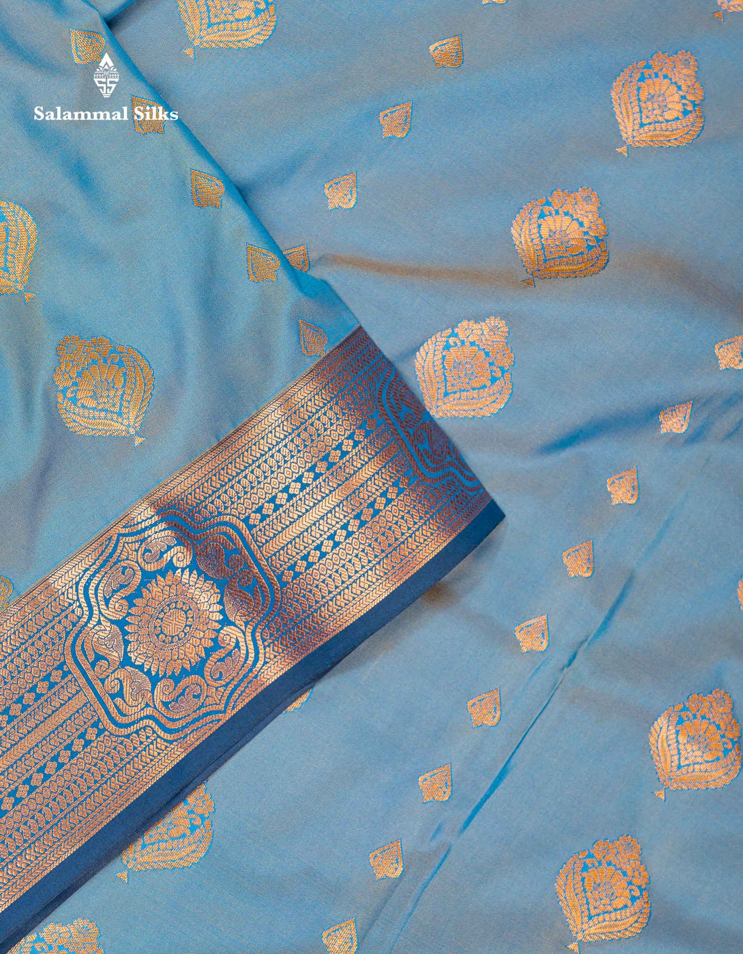 Beautiful Pastel Blue Zari Butta Semi Silk Saree With Contrast Dual Tone Navy Blue Blouse