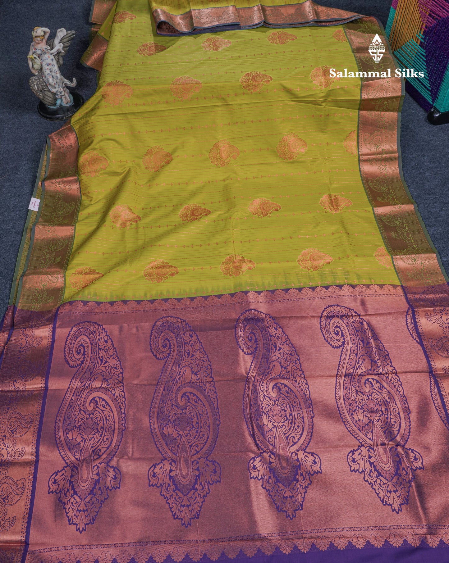 Manthulir Green Semi Silk Saree With Contrast Violet Blouse