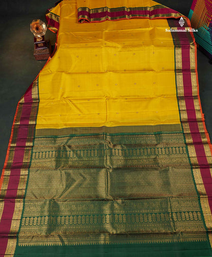 Korvai Pure Kanjivaram Silk Saree - Mustard Yellow Colour Body With Contrast Bottle Green Rettapet Border