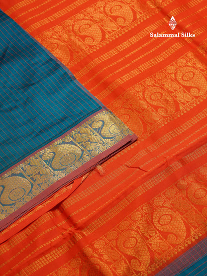 Beautiful Peacock Green Small Checks Semi Silk Cotton Saree With Contrast Orange Blouse