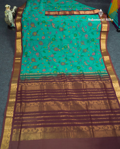 Peacock Green Pichwai Print Semi Silk Cotton Saree With Contrast Dark Brown Traditional Border