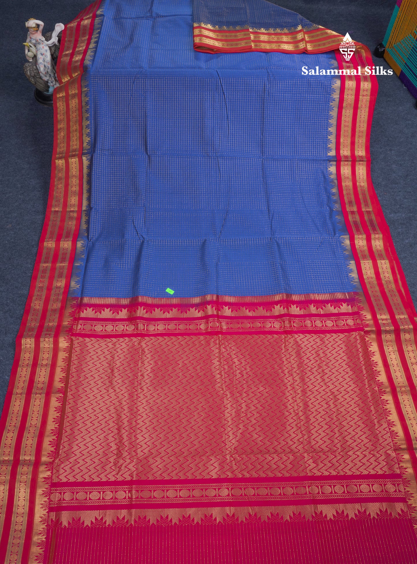 Ananda Blue Small Zari Checks Semi Silk Cotton Saree With Contrast Rani Pink Traditional Temple & Rettapet Border