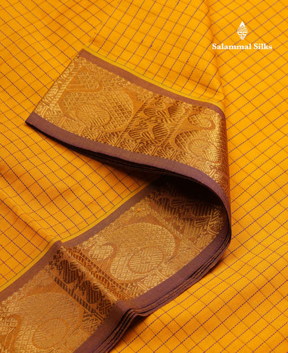 Beautiful Peacock Green Small Checks Semi Silk Cotton Saree With Contrast Orange Blouse