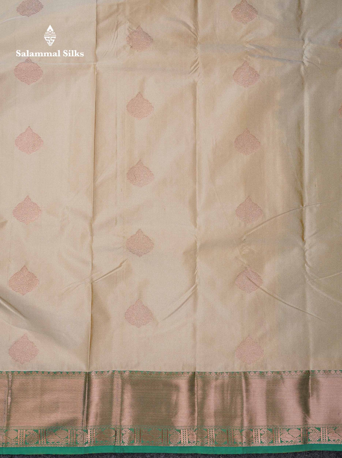 Beautiful Cream Sandal Zari Butta Semi Silk Saree With Contrast Sapphire Green Traditional Border