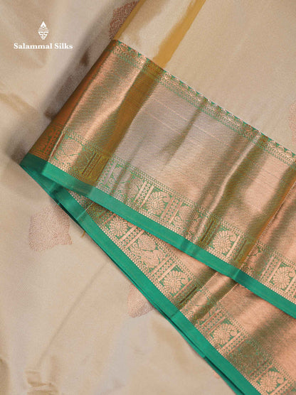 Beautiful Cream Sandal Zari Butta Semi Silk Saree With Contrast Sapphire Green Traditional Border