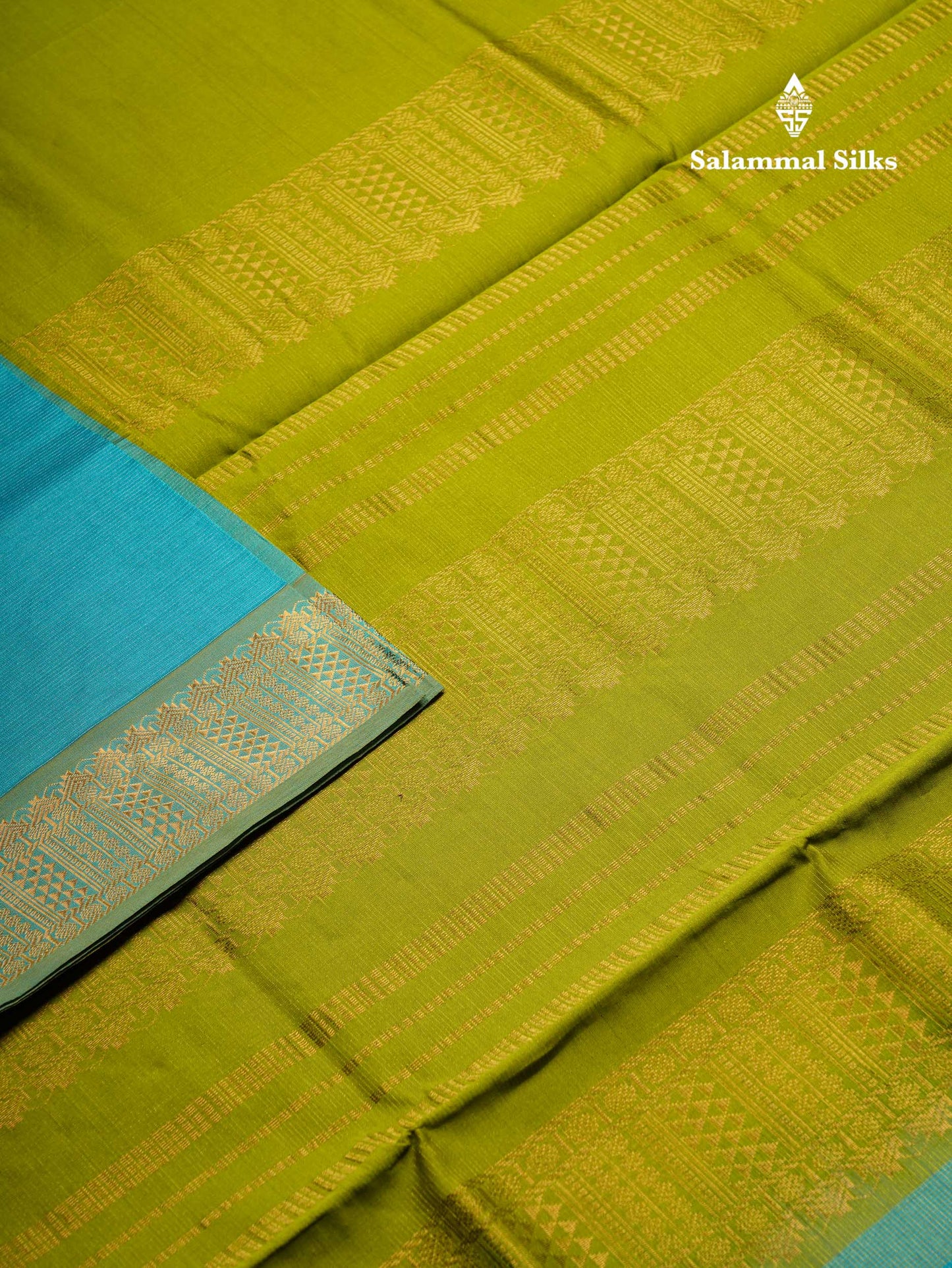 Beautiful Dual Tone Blue Vaira Oosi Lines Semi Silk Cotton Saree With Contrast Parrot Green Blouse