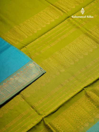 Beautiful Dual Tone Blue Vaira Oosi Lines Semi Silk Cotton Saree With Contrast Parrot Green Blouse