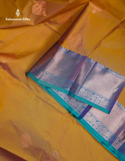 Beautiful Cream Sandal Zari Butta Semi Silk Saree With Contrast Sapphire Green Traditional Border