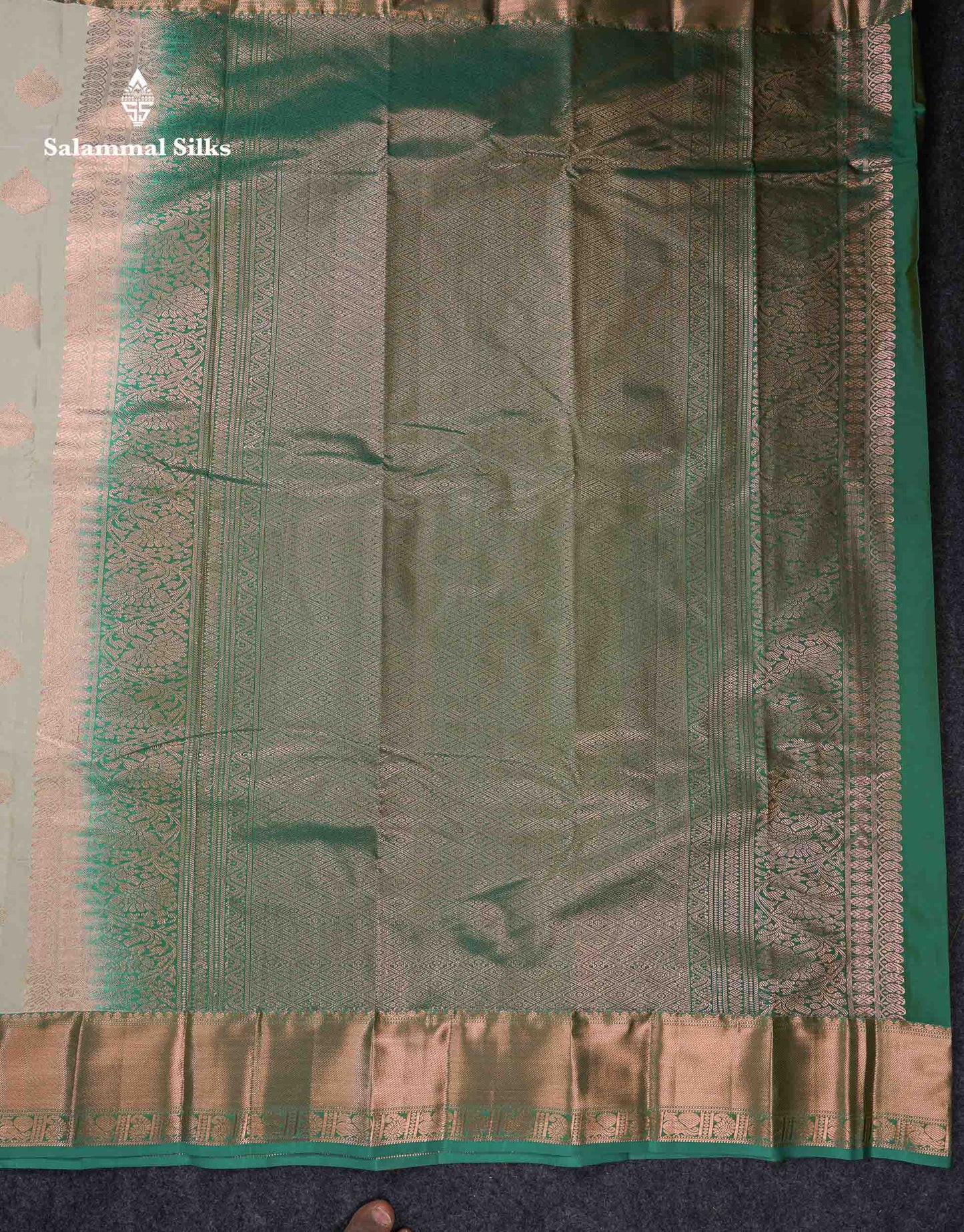 Beautiful Cream Sandal Zari Butta Semi Silk Saree With Contrast Sapphire Green Traditional Border