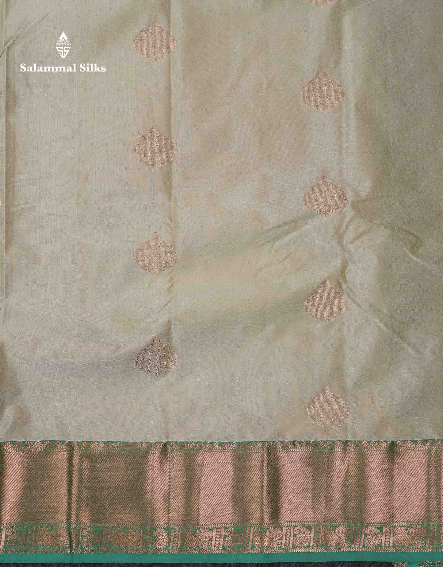 Beautiful Cream Sandal Zari Butta Semi Silk Saree With Contrast Sapphire Green Traditional Border