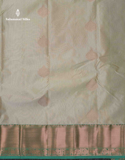 Beautiful Cream Sandal Zari Butta Semi Silk Saree With Contrast Sapphire Green Traditional Border