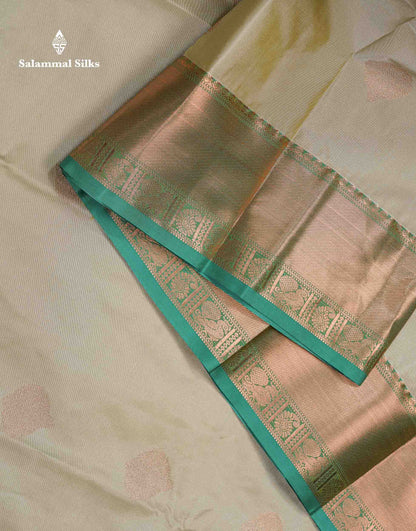 Beautiful Cream Sandal Zari Butta Semi Silk Saree With Contrast Sapphire Green Traditional Border
