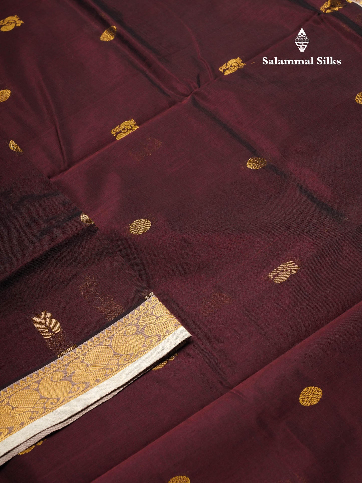 Beautiful Dark Brown Chakaram & Peacock Zari Butta Semi Silk Cotton Saree With Contrast Half White Blouse