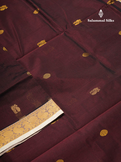 Beautiful Dark Brown Chakaram & Peacock Zari Butta Semi Silk Cotton Saree With Contrast Half White Blouse