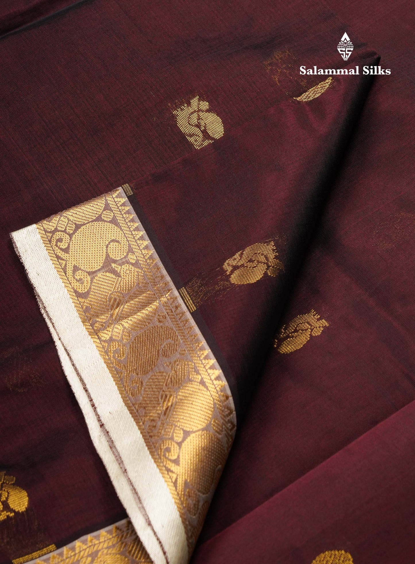 Beautiful Dark Brown Chakaram & Peacock Zari Butta Semi Silk Cotton Saree With Contrast Half White Blouse