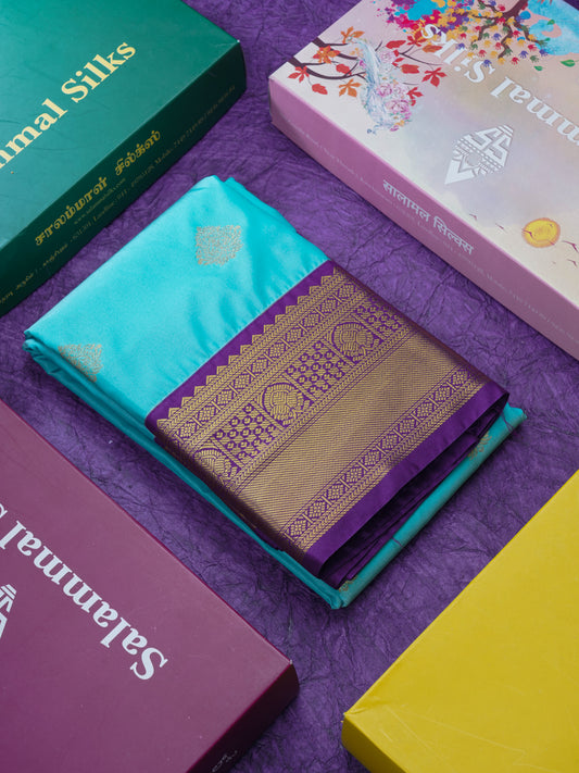 Sea Green Semi Silk Saree With Contrast Purple Traditional Border