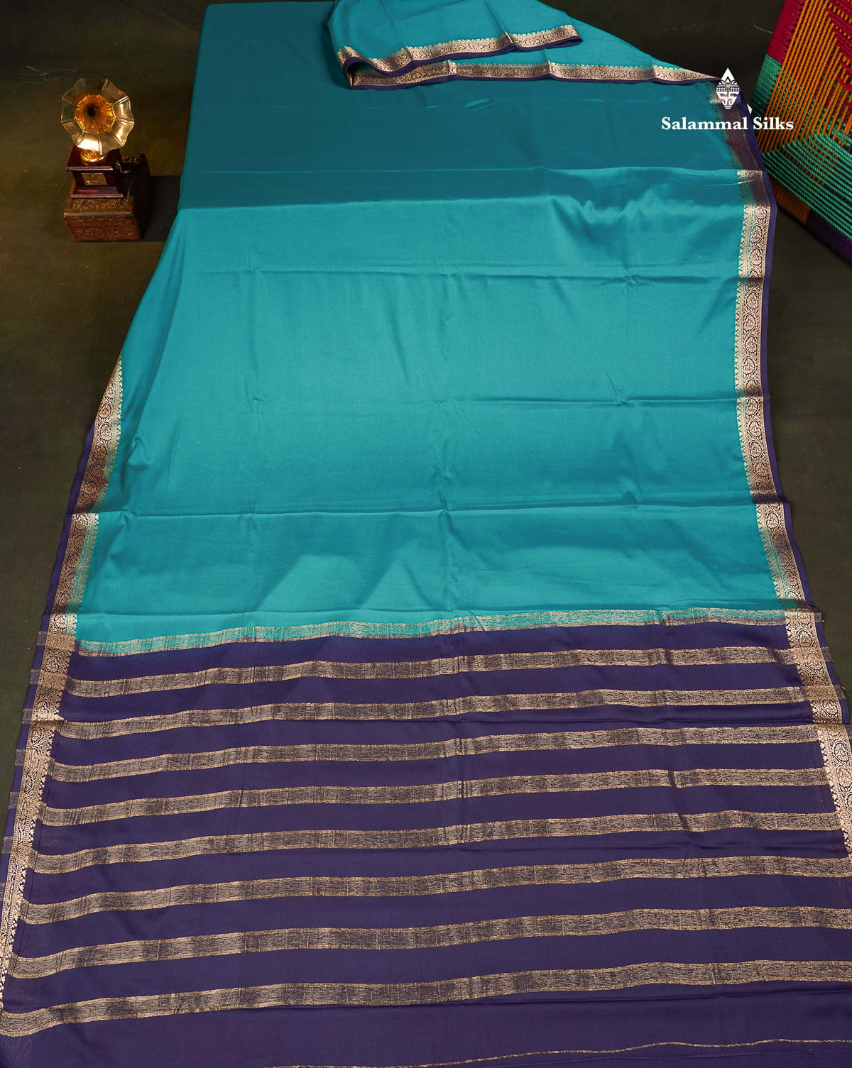 Semi Mysore Silk Saree - Teal Blue  Colour Body Plain With Contrast Navy Blue Small Border
