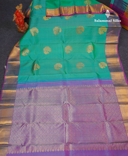 Beautiful Sapphire Green Pure Kanjivaram Silk Jacquard Saree With Contrast Purple Traditional Border