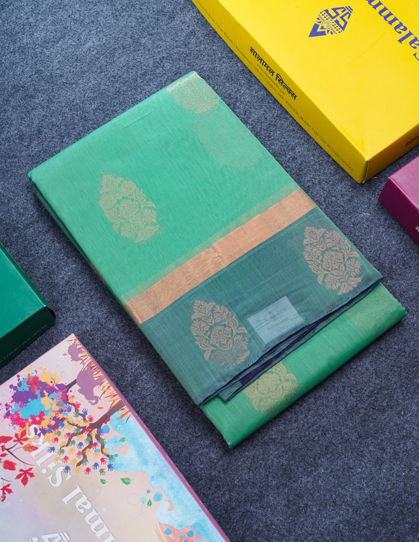 Beautiful Elaichi Green SICO Cotton Saree With Contrast Navy Blue Blouse