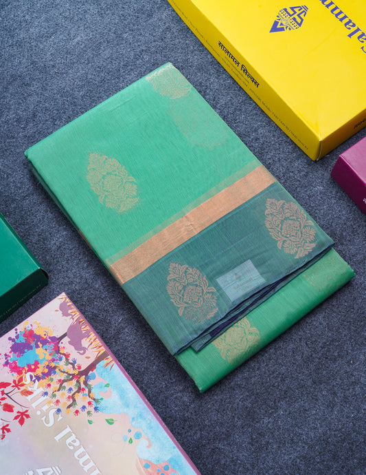 Beautiful Elaichi Green SICO Cotton Saree With Contrast Navy Blue Blouse