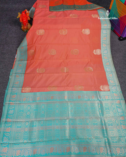 Semi Silk Saree -  Peach Colour Body With Contrast Sea Blue Fancy Border 