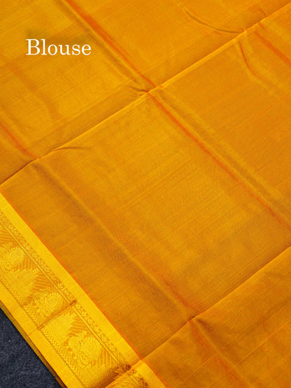 Beautiful Peacock Blue Semi Silk Cotton Saree With Contrast Yellow Traditional Border