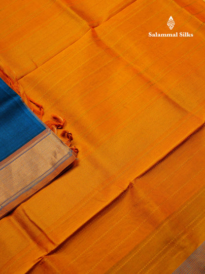 Ramar Blue Plain Pure Silk Cotton Saree With Contrast Mustard Yellow Blouse