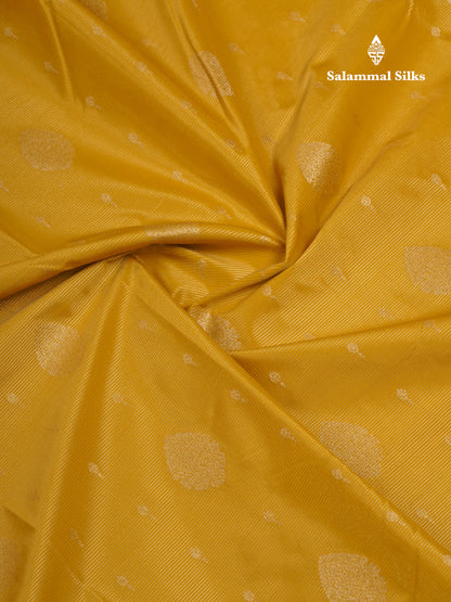 Beautiful Yellow Vaira Oosi With Butta Semi Silk Saree With Contrast Cream Sandal Traditional Rettapet Border