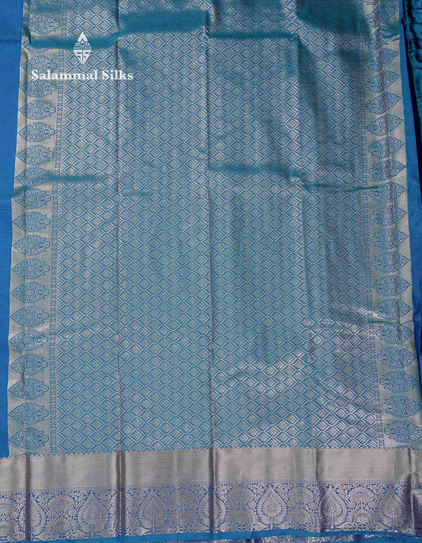 Beautiful Dual Tone Peacock Blue Zari Butta Semi Silk Saree With Traditional Border