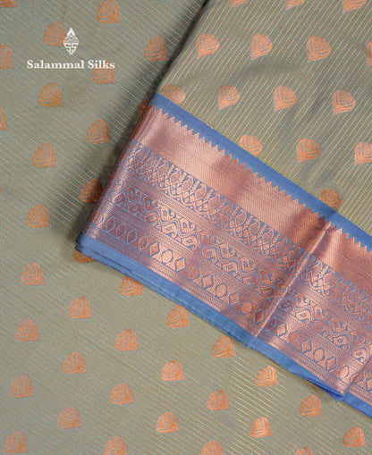 Beautiful Light Elaichi Green Zari Lines With Butta Semi Silk Saree With Contrast Dual Tone Blue Traditional Border