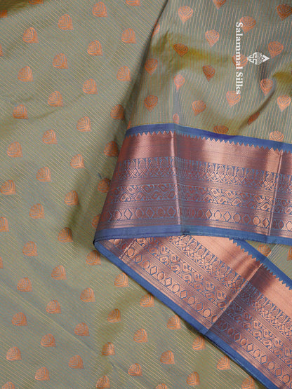 Beautiful Light Elaichi Green Zari Lines With Butta Semi Silk Saree With Contrast Dual Tone Blue Traditional Border