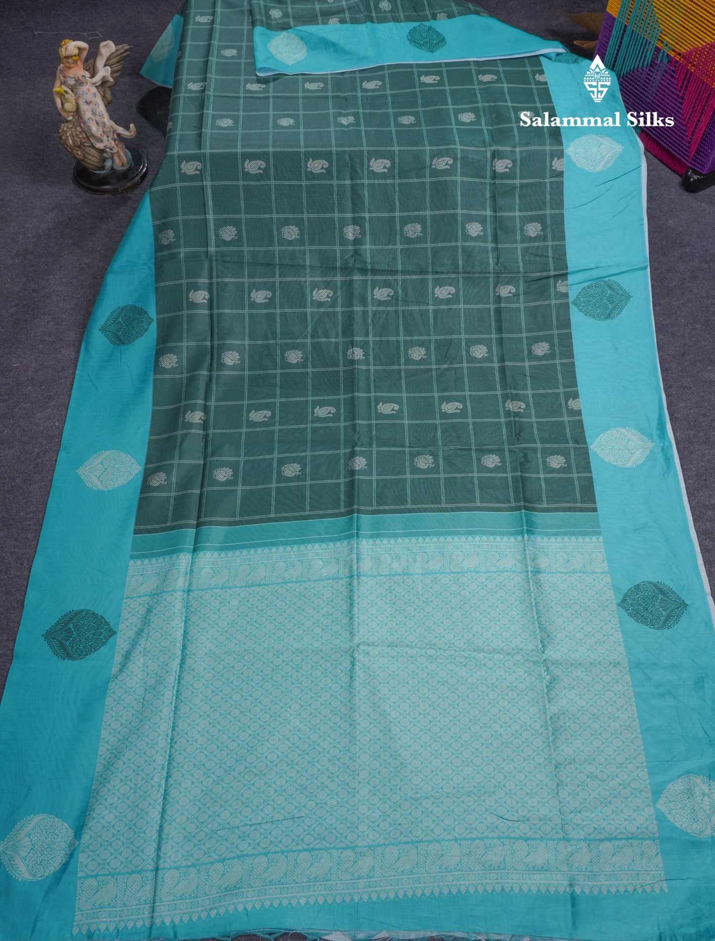 Rama Blue Checks With Butta Semi Tussar Saree With Contrast Sky Blue Fancy Border