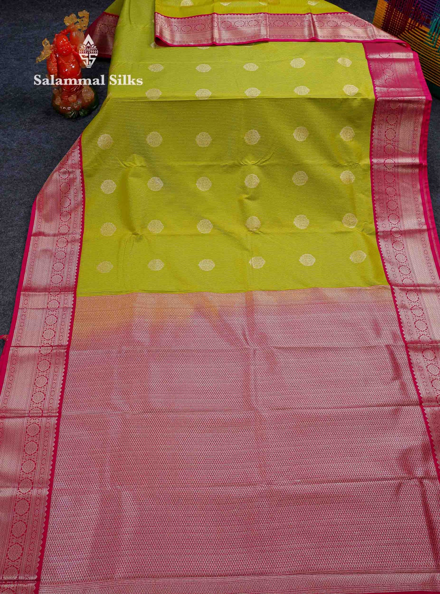 Beautiful Parrot Green Zari Lines With Butta Semi Silk Saree With Contrast Pink Traditional Border
