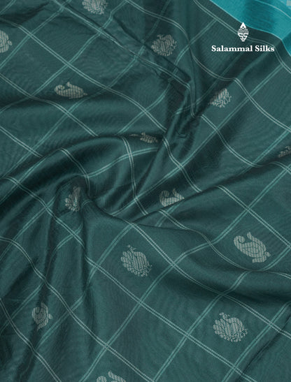 Rama Blue Checks With Butta Semi Tussar Saree With Contrast Sky Blue Fancy Border