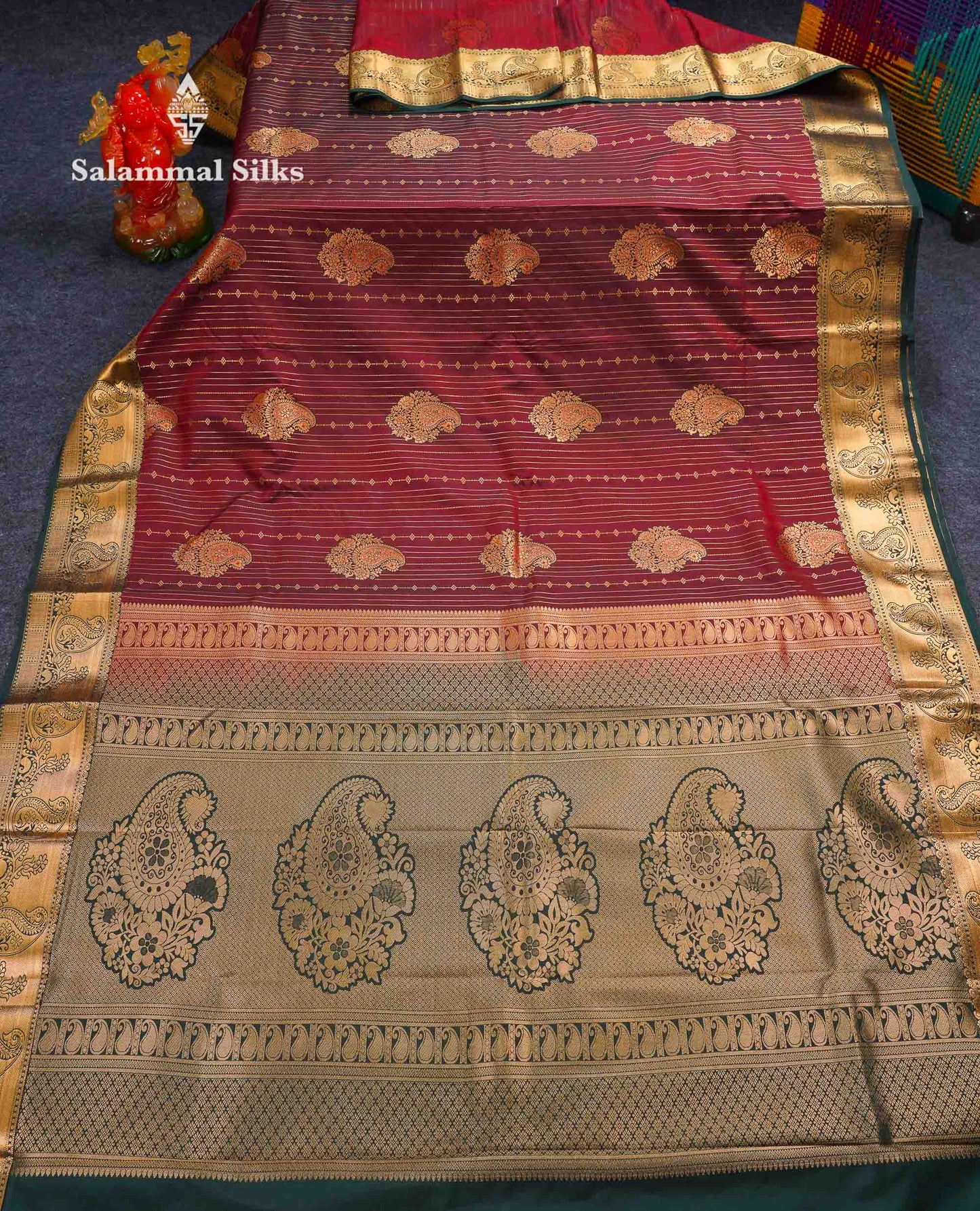 Beautiful Dark Maroon Zari Lines With Butta Semi Silk Saree With Contrast Bottle Green Traditional Border