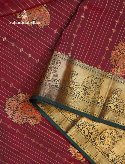 Beautiful Dark Maroon Zari Lines With Butta Semi Silk Saree With Contrast Bottle Green Traditional Border