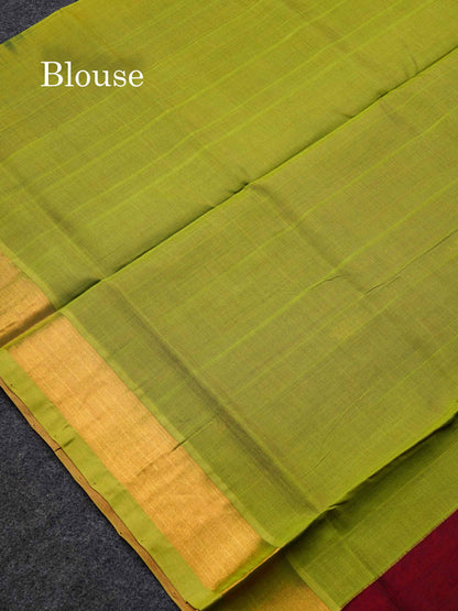 Dark Maroon Pure Silk Cotton Saree With Contrast Parrot Green Blouse