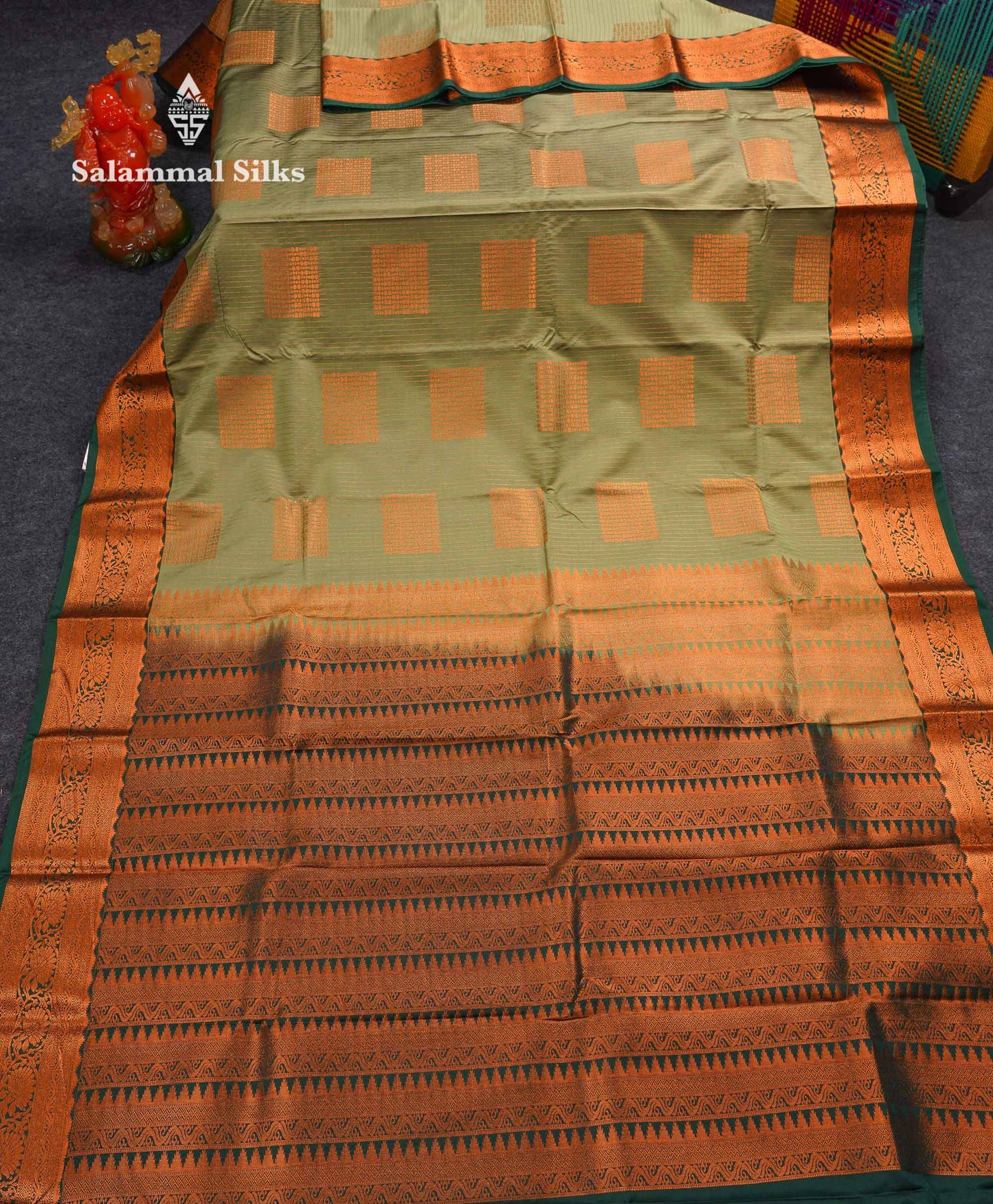 Beautiful Light Olive Green Zari Lines Semi Silk Saree With Contrast Bottle Green Traditional Border