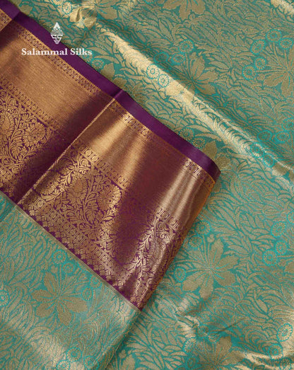 Beautiful Sea Green Tissue Bridal Semi Silk Saree With Contrast Dark Violet Traditional Border
