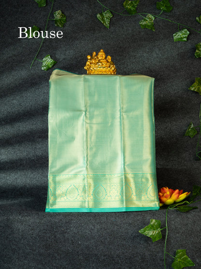 Semi Silk Pattu Pavadai  (Orange) with Sapphire Green Colour Blouse 18"