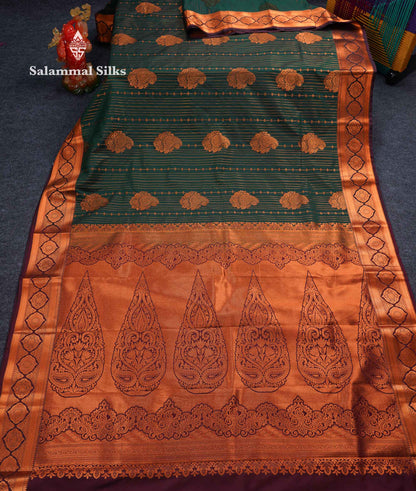 Beautiful Dark Maroon Zari Lines With Butta Semi Silk Saree With Contrast Bottle Green Traditional Border