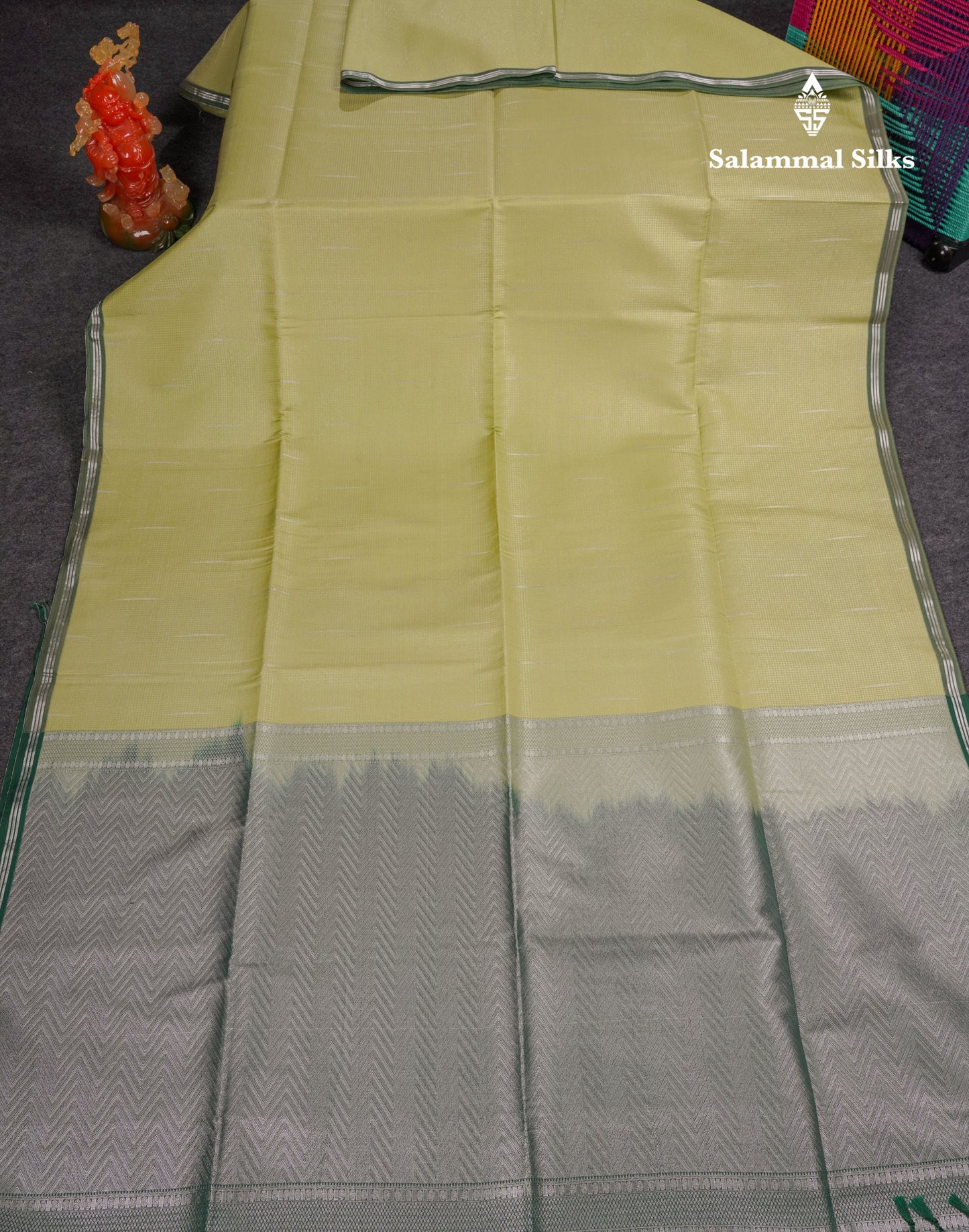 Light Pink Tiny Zari Checks With Malli Moggu Butta Semi Soft Silk Saree With Contrast Small Purple Border