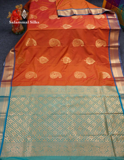 Beautiful Rust Orange Big Zari Butta Semi Silk Saree With Contrast Sapphire Green Blouse