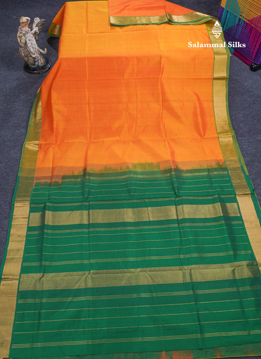 Mango Yellow Plain Pure Silk Cotton Saree With Contrast Bottle Green Blouse