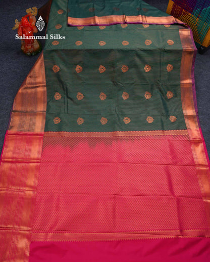Beautiful Bottle Green Zari Lines With Butta Semi Silk Saree With Traditional Evening Morning Border