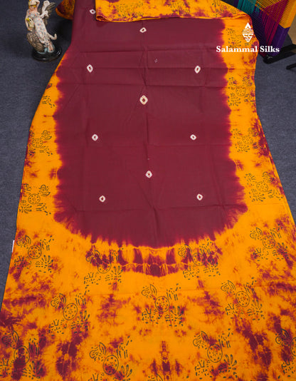 Dark Brown Batik Print Sungudi Pure Cotton Saree With Contrast Mango Yellow Blouse