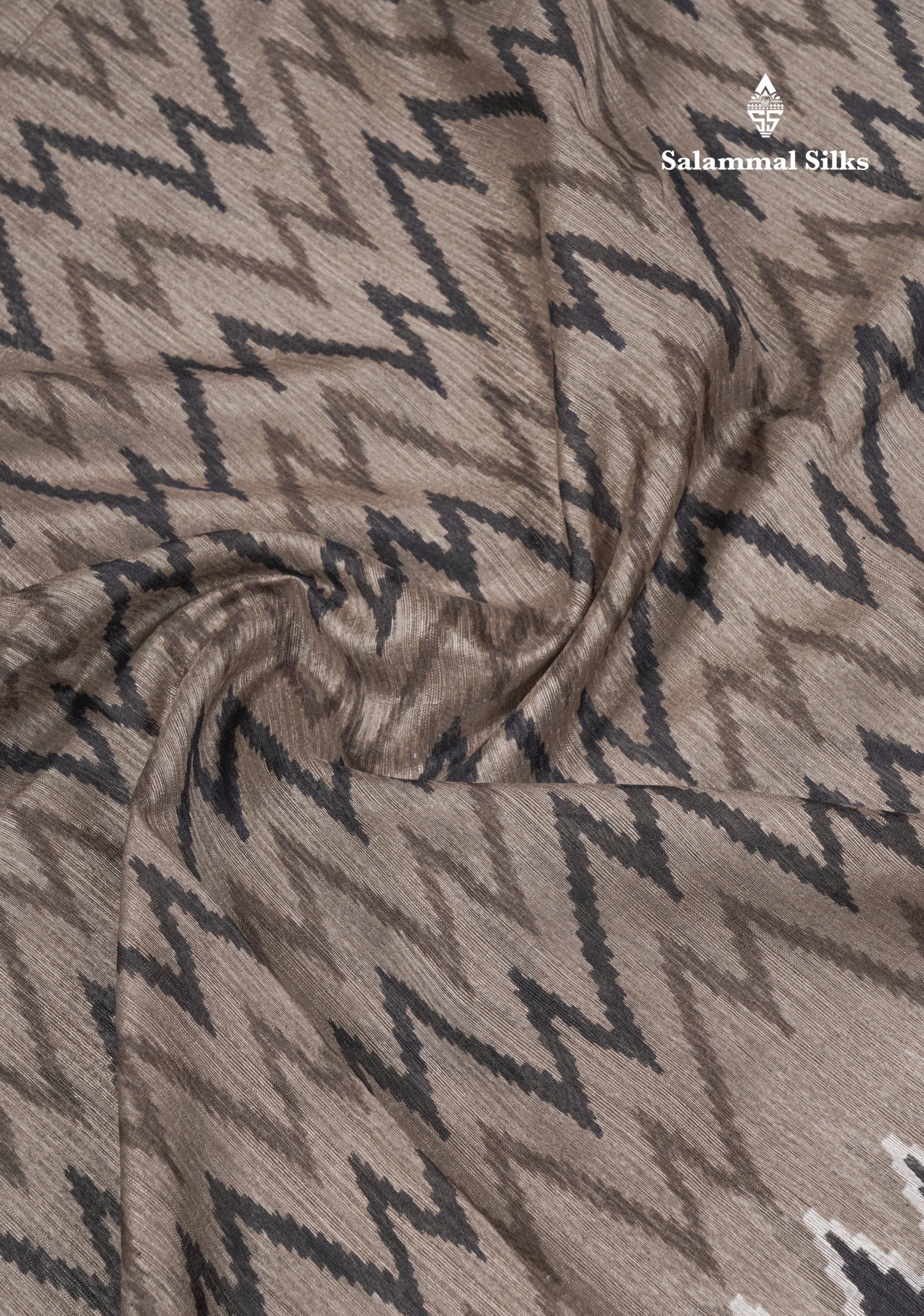 Light Brown Semi Tussar Fancy Saree With Contrast Black Border