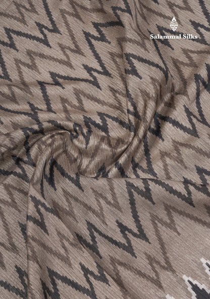 Light Brown Semi Tussar Fancy Saree With Contrast Black Border