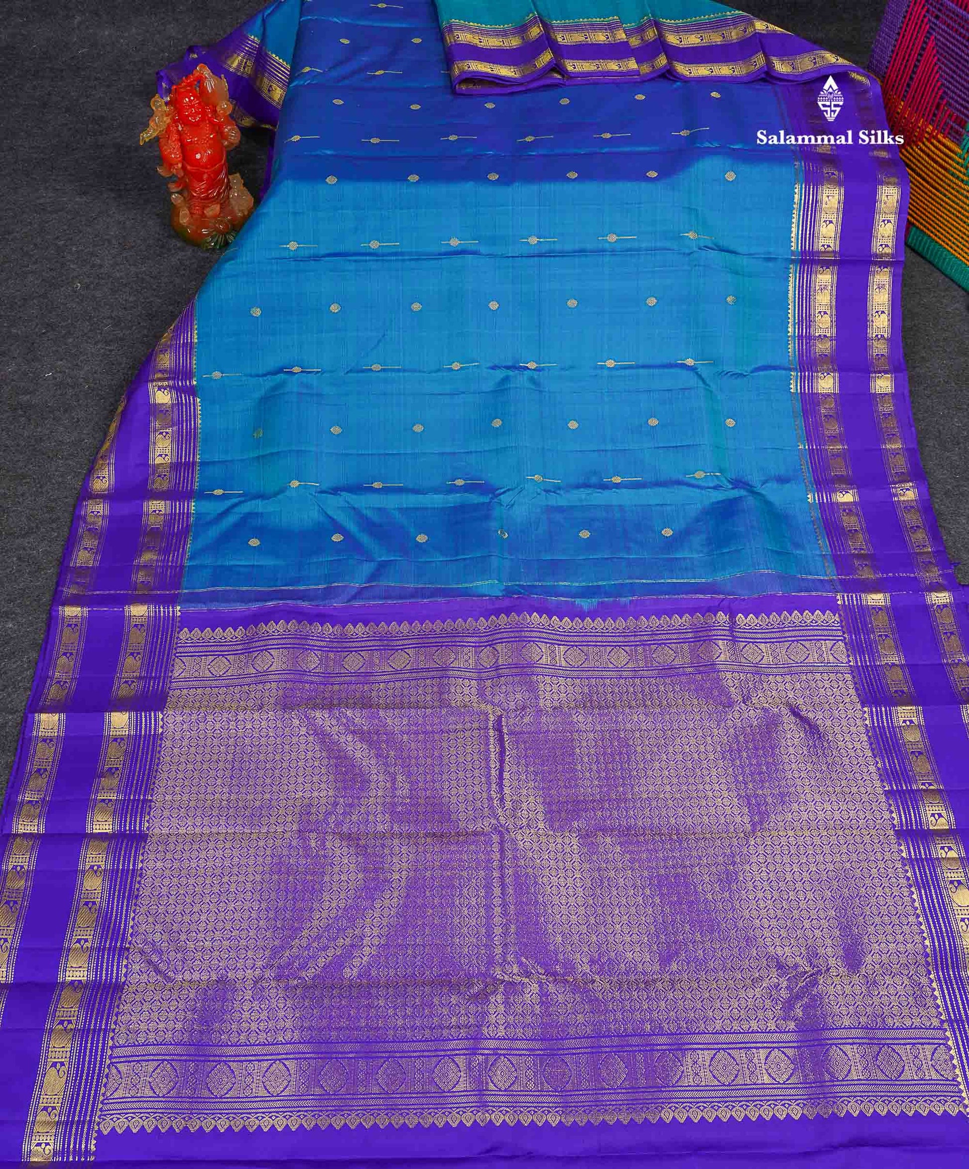 Pure Kanjivaram Silk Saree -Peacock Blue Colour Body Butta With Contrast Violet Traditional Gap Border